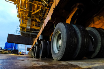 Transporter wheels to move heavy bulk.