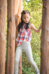 happy little asian girl child having fun to playing in the playground in summer time with smile and laughing healthy, funny smiling face adorable lovely female kid. happy vacation lifestyle concept.