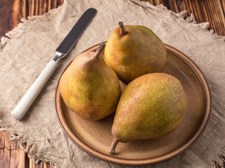 pears for cooking vegetarian dishes on the kitchen table.