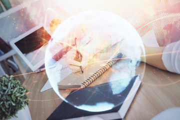 Fototapete - International business hud over woman's hands writing background. Concept of hard work. Double exposure