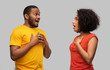 © Syda Productions - relationships and people concept - happy excited african american couple over grey background