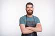 © Vulp - Cooking courses figure. Portrait of a confident bearded cooker o