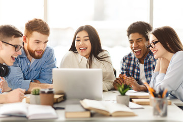 Online education. Group of students studying on computer