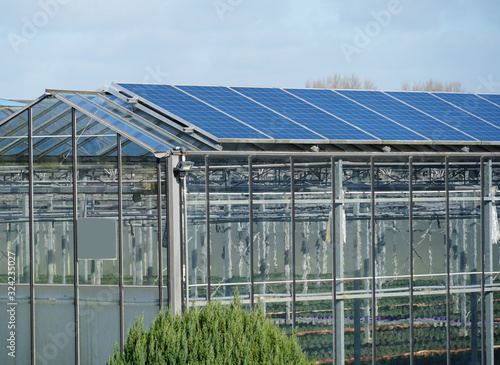 Photovoltaic solar panels installed on a greenhouse in the Netherlands.