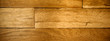 Banner sized background photo of ancient oak wood floor parquet.
