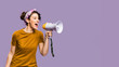 Woman shouts in megaphone with copy space