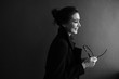 © Oleg Samoylov - Black-white close-up portrait of a beautiful young girl in black round sunglasses.Girl poses for the photographer.Fashion portrait