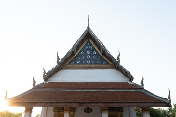 The roof of chapel (Ubosot), the white and golden building near the Amphawa floating market Samut Songkhram Thailand