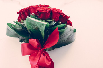 Poster - Luxury bouquet of red roses on marble background, beautiful flowers as holiday love present on Valentines Day