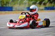 © Mark_studio - Young go cart racer on circuit