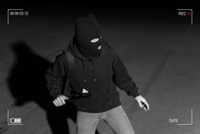 Robber Prepared For Crime In Dark Alley