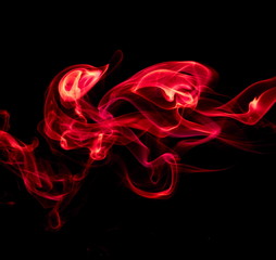 Red smoke on black background