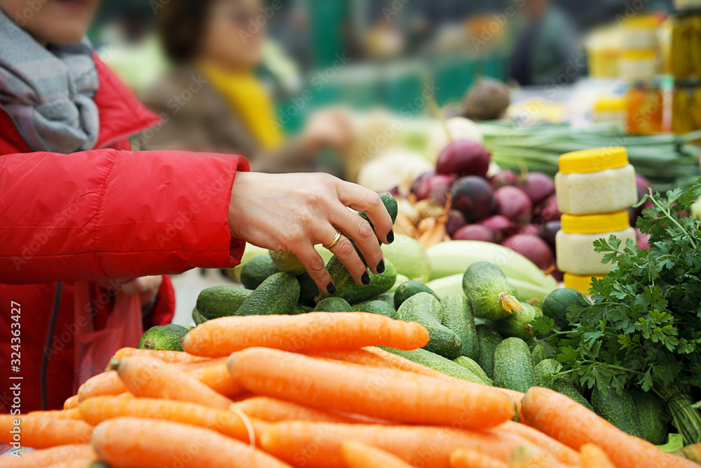 Sales of fresh and organic fruits and vegetables at the green market or farmers market.