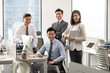 © Blue Jean Images - Chinese business people working in office