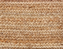 Closeup Of A Braided, Woven Rug, Textured Backdrop