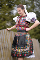 Beautiful slovak woman in traditional costume. Slovak folklore.