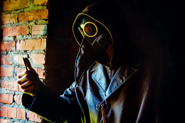 Wall Mural - Terrible plague doctor with scalpel. Masked maniac. Halloween and horror concept