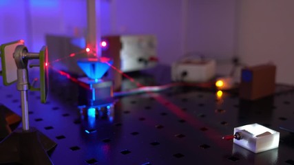 Canvas Print -  laser in a quantum optics lab. Semiconductor laser on optical table in a quantum physics optics lab.