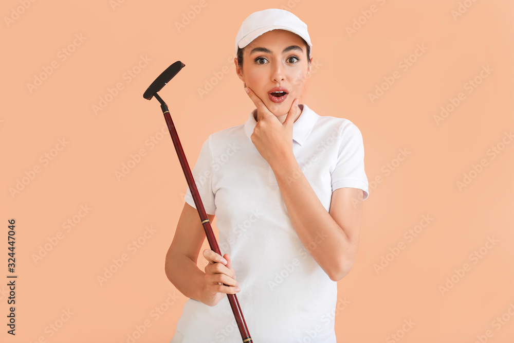 Surprised female golfer on color background