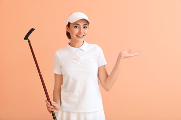 Poster - Beautiful female golfer on color background