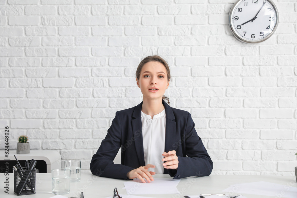 Young woman during job interview in office