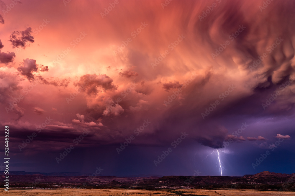 Stormy sky with lightning at sunset - obrazy, fototapety, plakaty 