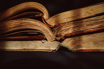 very old shabby book on the table