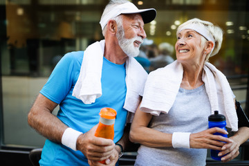 Wall Mural - Happy senior people running to stay helathy and lose weight