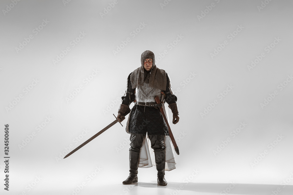 Brave armored knight with professional weapon fighting isolated on ...
