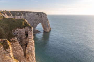 Wall Mural - Rocks on the coast of the English channel strait. Etretat village, Normandy region, France.