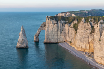 Wall Mural - Rocks on the coast of the English channel strait. Etretat village, Normandy region, France.