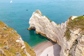 Wall Mural - Rocks on the coast of the English channel strait. Etretat village, Normandy region, France.