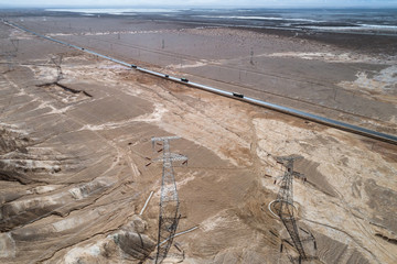 Wall Mural - aerial view of desert road in northwest of China