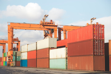 General view from a port with stacked containers and cranes