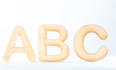 wooden alphabet letters on white background