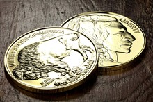 1 Ounce American Buffalo Gold Bullion Coins On Wooden Background