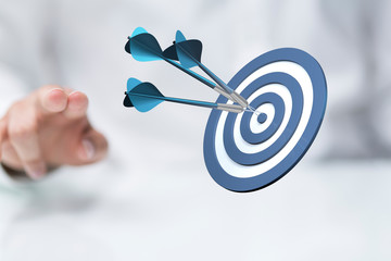 Dart arrow on target dartboard, Business success concept..