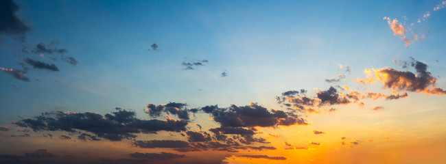 Wall Mural - beautiful sunset with blue sky and clouds natural background.