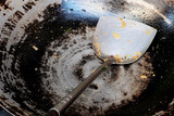 Fototapeta Do pokoju - Dirty used cooking pan and spatula and space for write wording, improper behavior to use dirty equipment to cook the food that cause chronic disease such as diarrhea and cancer. Cleanliness is needed