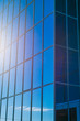 © Асель Иржанова - modern glass building. blue glass and concrete building for offices and businesses