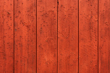Red Wooden Wall Of A Norwegian Cabin Or Barn