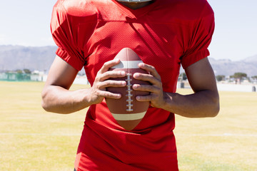 Wall Mural - Football player with ball