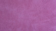 Lilac pink suede leather background with neat texture and copy space, fuzzy leather with a napped finish, showing softness and pliability, fabric sample for sewing, upholstery, shoes or bags making