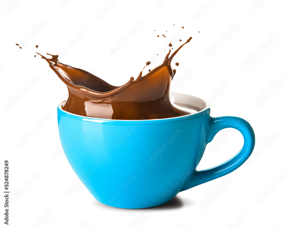 Splash of hot chocolate in cup on white background