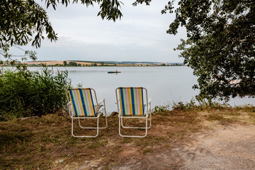 Two chairs with a view of the lake