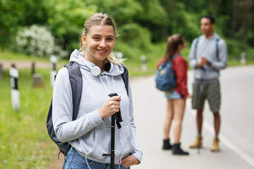 Wall Mural - portrait of young blond hair female hiker.