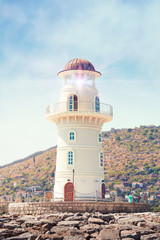 Wall Mural - Lighthouse in sunny day, Vertical image