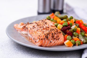 Wall Mural - Baked salmon with boiled vegetable