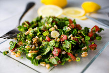 Tilt Shift View Of Chopped Herb Salad With Farro