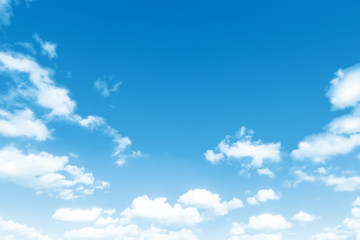 Wall Mural - blue sky with white clouds background natural color top perspective up view. Design mockup with copy space. Nature landscape wallpaper. Abstract flat backdrop